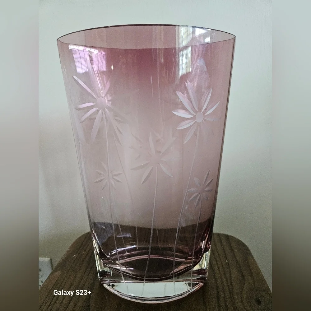 Elegant oval clear cut purple vase.